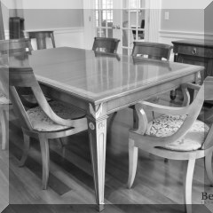 F09. Kindel double banded mahogany dining table. 30” x 78” w x 45”w Includes 2 leaves measuring 16” each - $1400